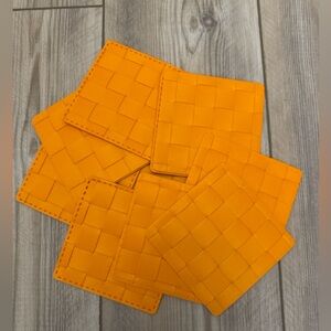 Set of Orange Woven Coasters